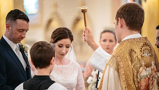 Traditional Catholic Blessing of a Marriage of a couple, blessing with holy water